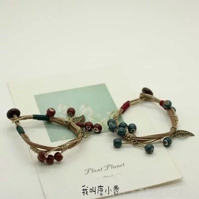 亻十葉